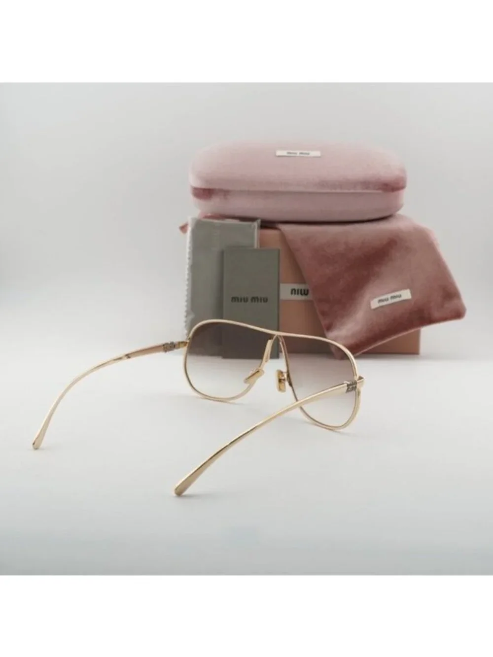 Miu Miu MUA56S 5AK90L Geometric Sunglasses – Gold/Brown Gradient